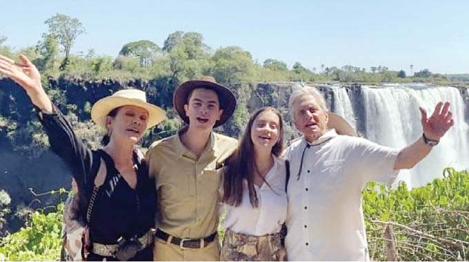 Catherine Zeta Jones left with her familty at the Victoria Falls
