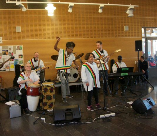 Jesina Chikutu foreground leads the Swedish based Zimbabwe Traditional Unity Band during a performance in EUrope