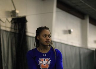 Tasha Dembo prepares to serve during a Marauders match in 2019