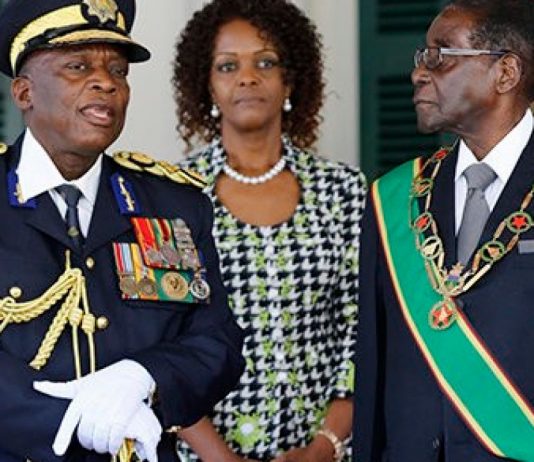 Chihuri says President Mnangagwa targeting him over a woman Chihuri and Mugabe 520x381 1