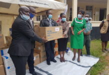 Manicaland ZRCS provincial manager Munyaradzi Chikukwa hands over the PPEs to be used at the Victoria Chitepo Hospital in Mutare, Manicaland recently