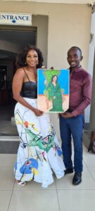 Ralph Jamu Ralph Jamu with socialite Zodwa Mkandla after handing over a painting to the businesswoman