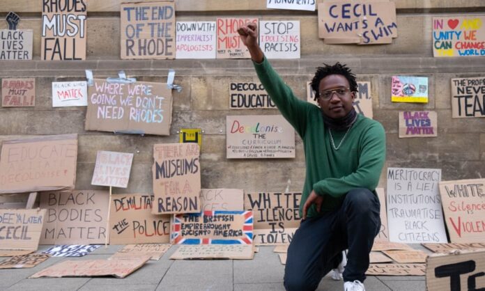 Simukai Chigudu at a protest in Oxford in June last year