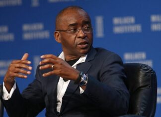 Strive Masiyiwa, founder and chairman of Econet Wireless Global Ltd., speaks during the annual Milken Institute Global Conference in Beverly Hills , California, U.S., on Monday, May 2, 2016. The conference gathers attendees to explore solutions to today's most pressing challenges in financial markets, industry sectors, health, government and education. Photographer: Patrick T. Fallon/Bloomberg via Getty Images