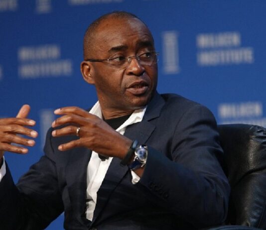 Strive Masiyiwa, founder and chairman of Econet Wireless Global Ltd., speaks during the annual Milken Institute Global Conference in Beverly Hills , California, U.S., on Monday, May 2, 2016. The conference gathers attendees to explore solutions to today's most pressing challenges in financial markets, industry sectors, health, government and education. Photographer: Patrick T. Fallon/Bloomberg via Getty Images