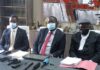 Advocate Thabani Mpofu flanked lawyer Tendai Biti and Dr Musa Kika during a press conference in Harare