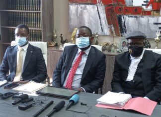 Advocate Thabani Mpofu flanked lawyer Tendai Biti and Dr Musa Kika during a press conference in Harare