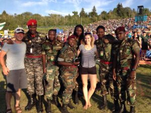 Blessing Tinashe Moyo, third from left, poses for photo with Jah Prayza, some fans and members of the Third Generation Band during one of their several overseas tours in 2016