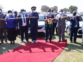 No breathing space for criminals in Zimbabwe – ED President Mnangagwa commissions the latest ZRP vehicle fleet while Commissioner General Godwin Matanga and some senior government officials look on
